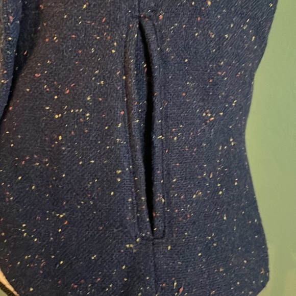 Navy blue vest with specks of yellow and red design. - Picture 3 of 6